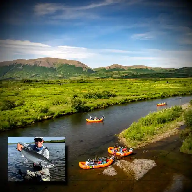Scenic Goodnews River wilderness view with rafts and angler holding large coho salmon on Alaska float trip